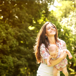 happy woman and baby